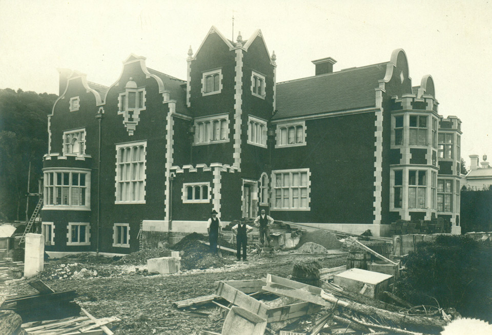 View from South East during construction with workmen.