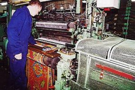 A carpet runner is machined by Feltex New Zealand for laying in the billiard room.